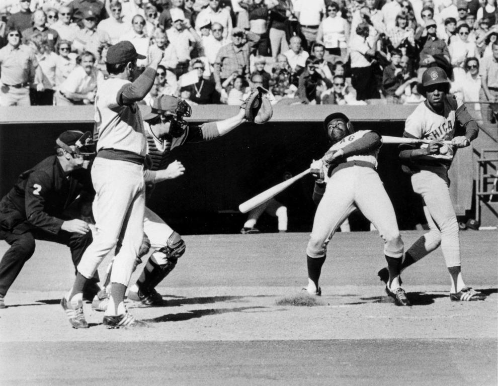 Bill Madlock does yoga, Jose Cardenal checks his swing too late to avoid Madlock’s head, and a first base coach creeps close to the plate in an attempt to steal the catcher’s signs.